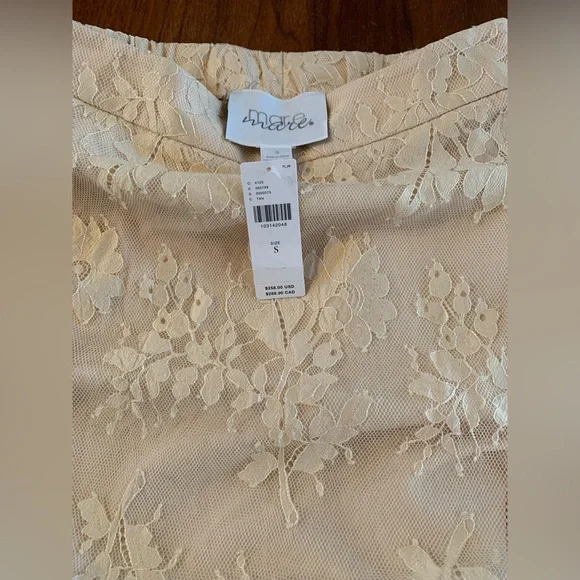 Mare Mare Lace Trimmed Midi Skirt
Anthropologie
In: Tan - Picture 5 of 5